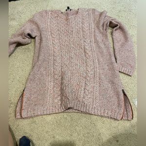 pink, grey, cream are colors in the sweater